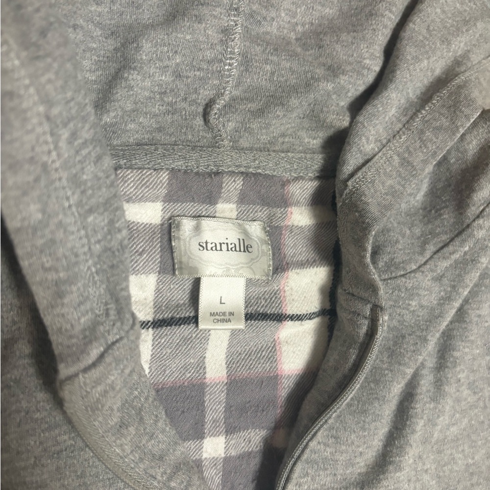 Grey Zip up hoodie. Used and a bit worn. Size large.